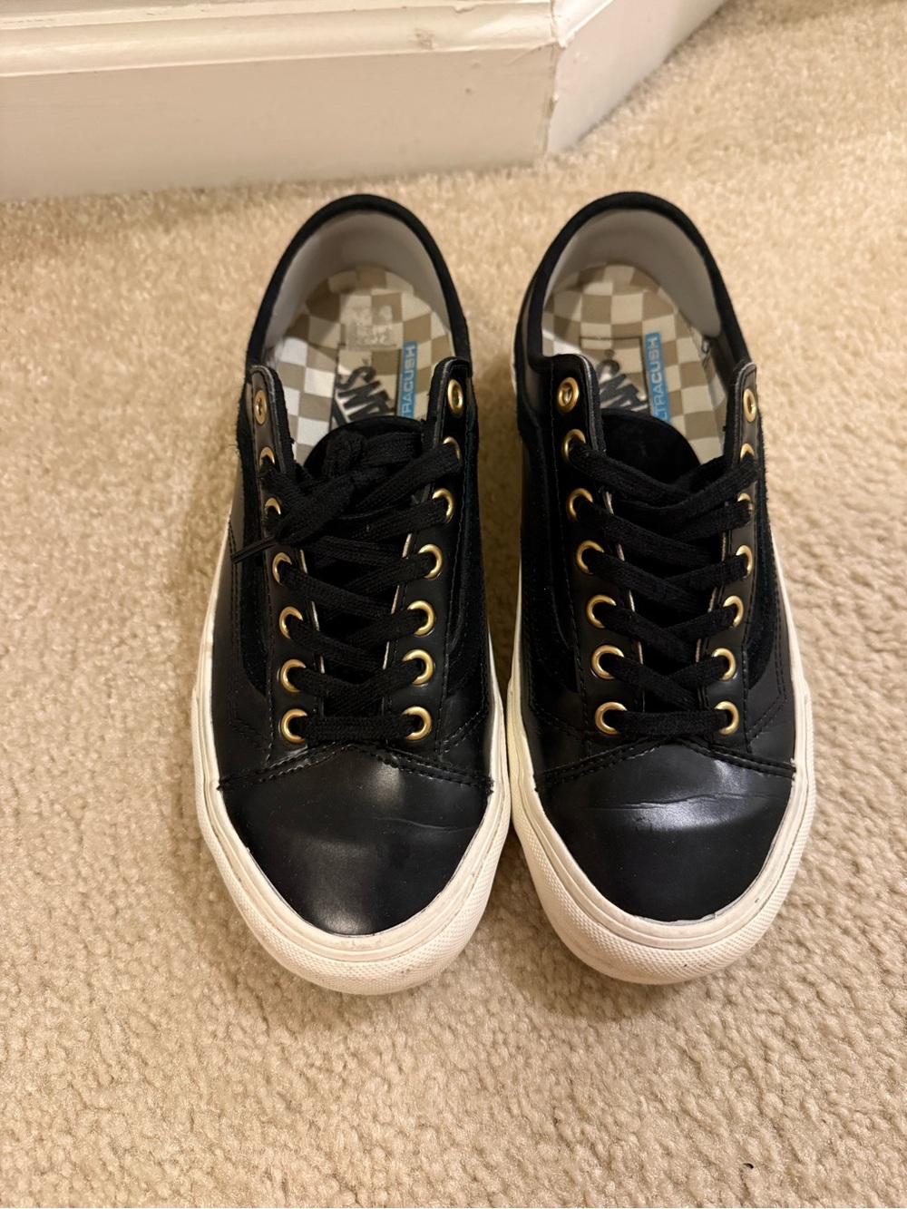 Black Low-Top Sneakers with Gold Eyelets - Women
